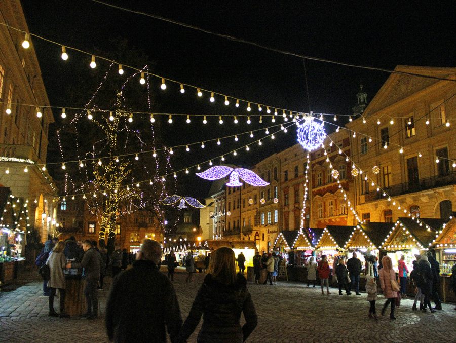 Lights over a European Christmas market at night